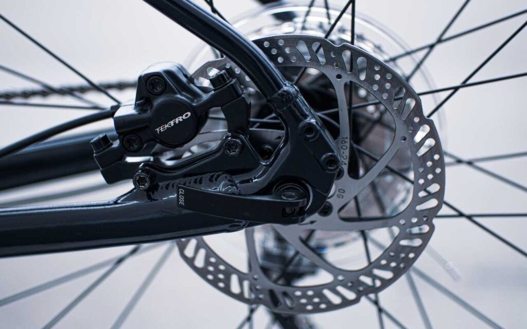 Rim brakes allow a bike to go downhill faster while still being able to safely stop.